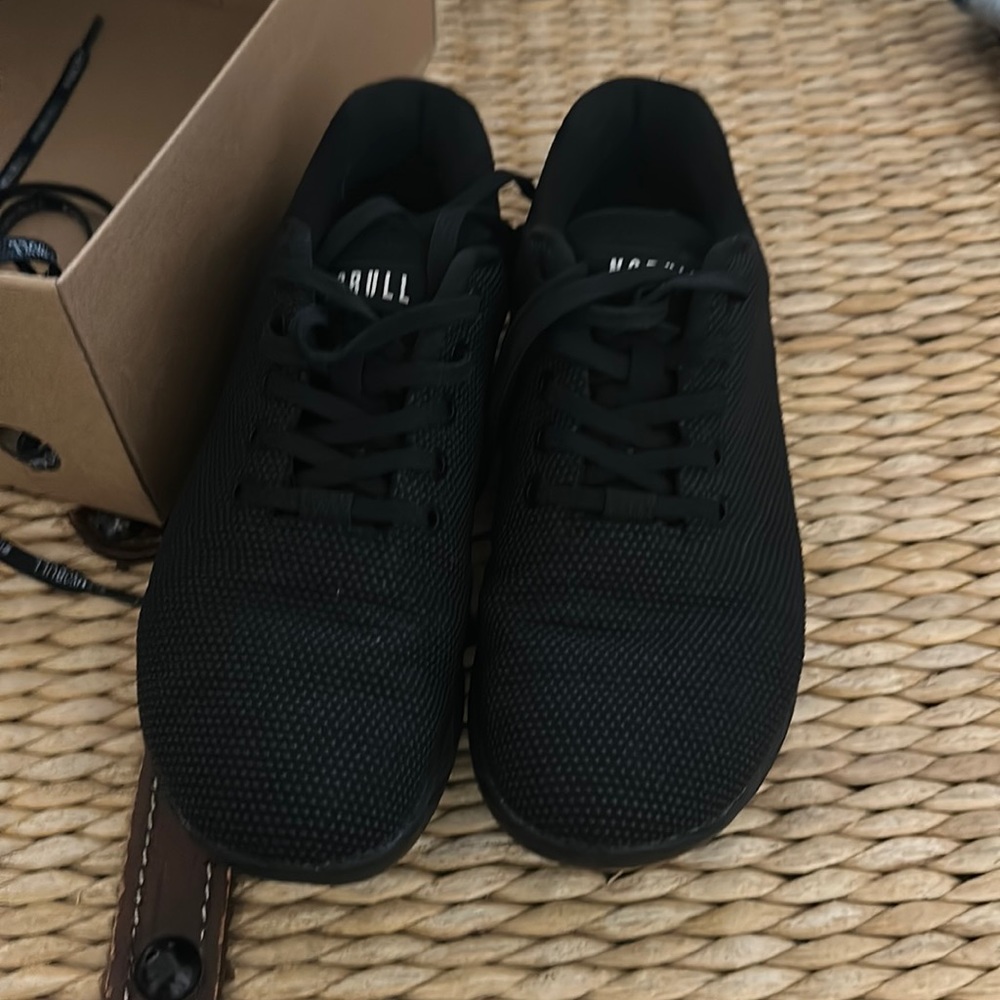 All black NoBull size 9.5 in women’s, men’s size 8